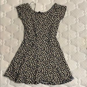Black, white-daisy covered dress